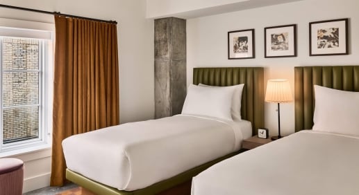 two twin beds in the bedroom