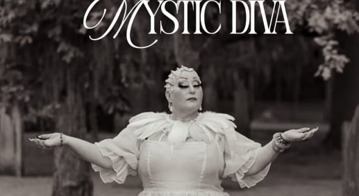 A mystical performer dressed in a flowing white gown, arms raised in an enchanting pose, standing outdoors beneath draping trees.