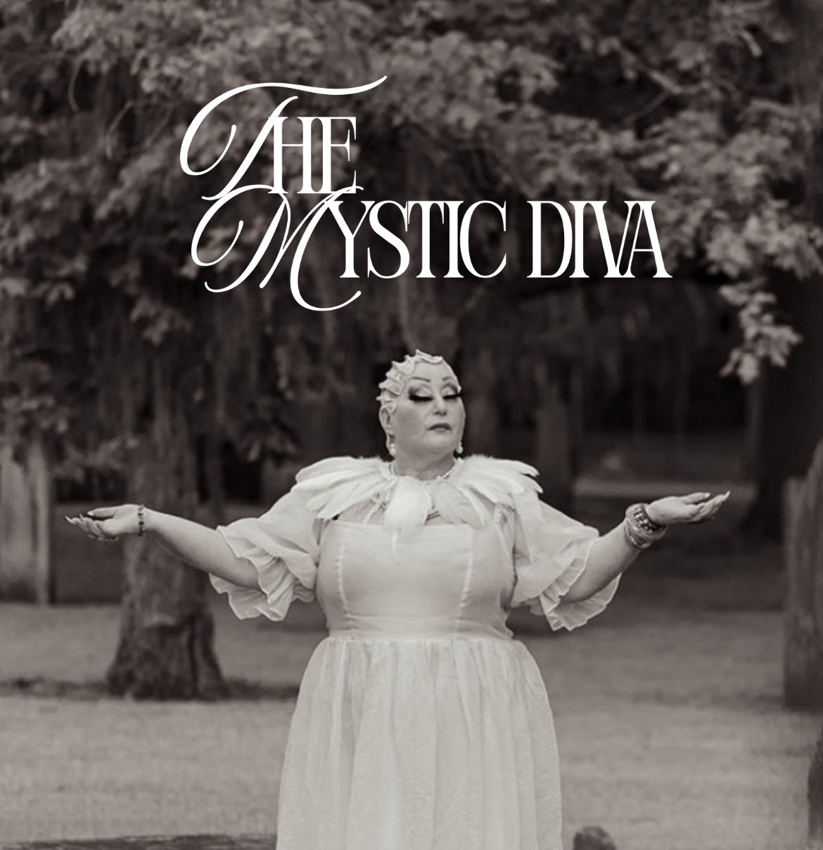 A mystical performer dressed in a flowing white gown, arms raised in an enchanting pose, standing outdoors beneath draping trees.