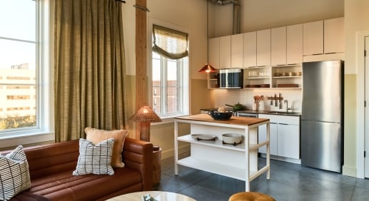 The Ann Savannah suite interior — living area to kitchen