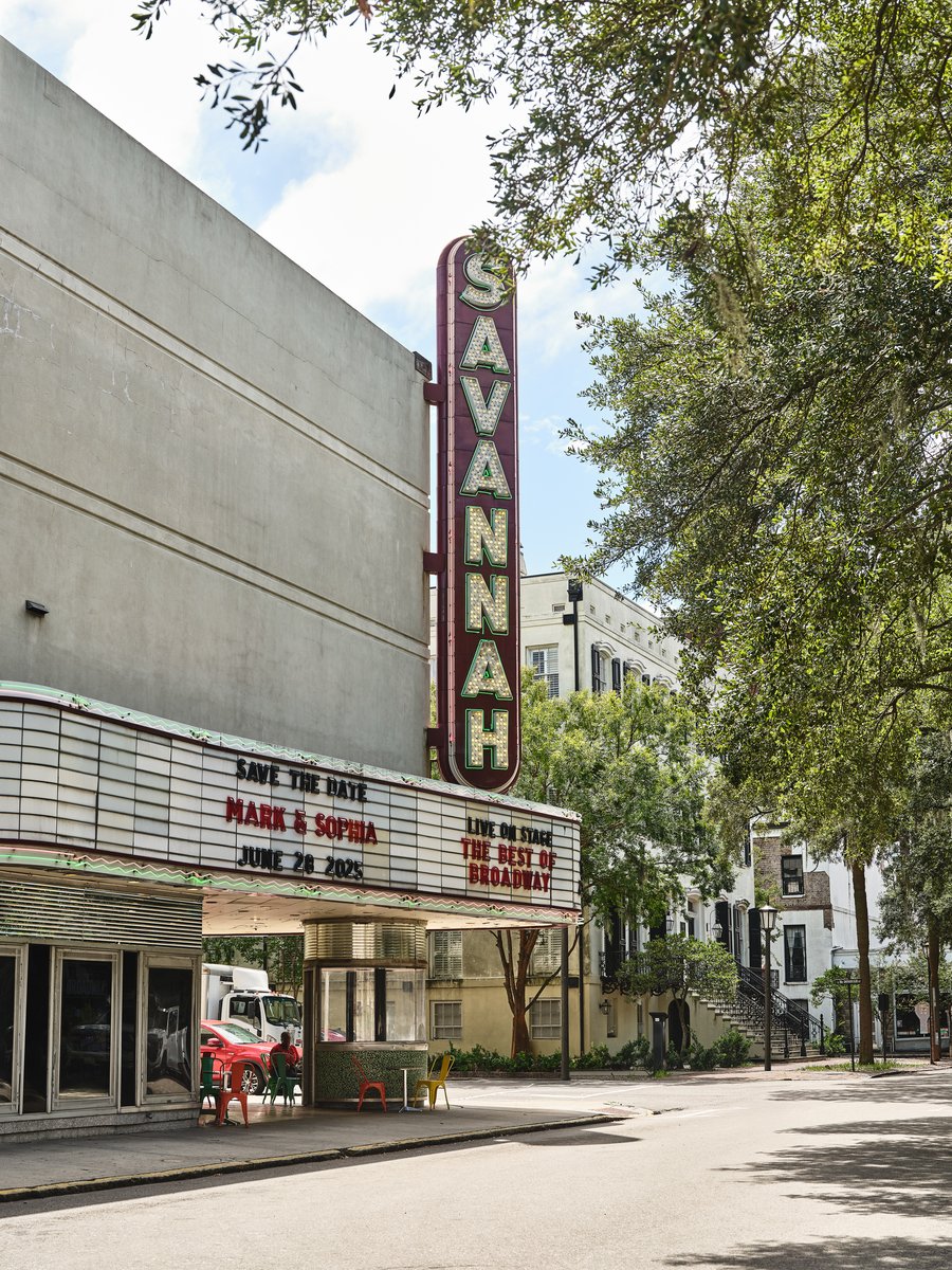 Savannah Theatre's vintage marquee on a moss-draped street in the historic district